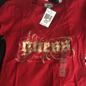 Brand new never worn two Guess shirts